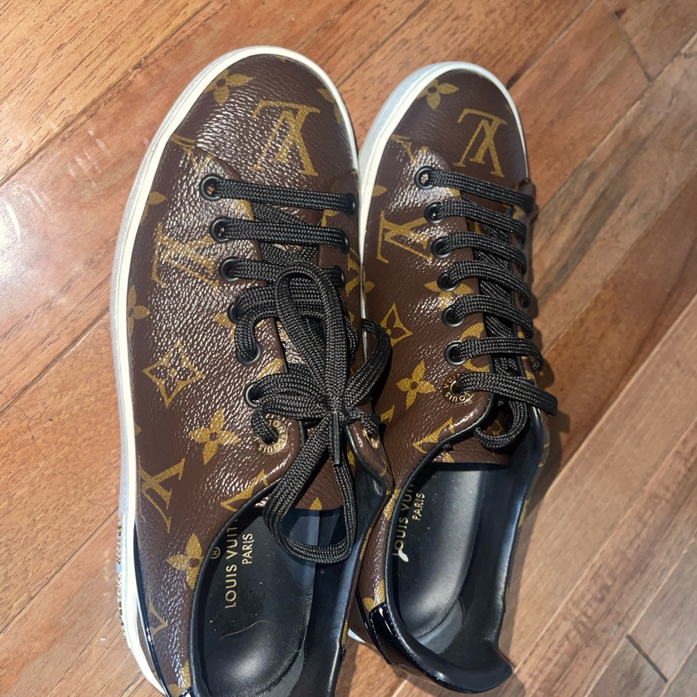 LV Monogram Pat and leather sneakers.